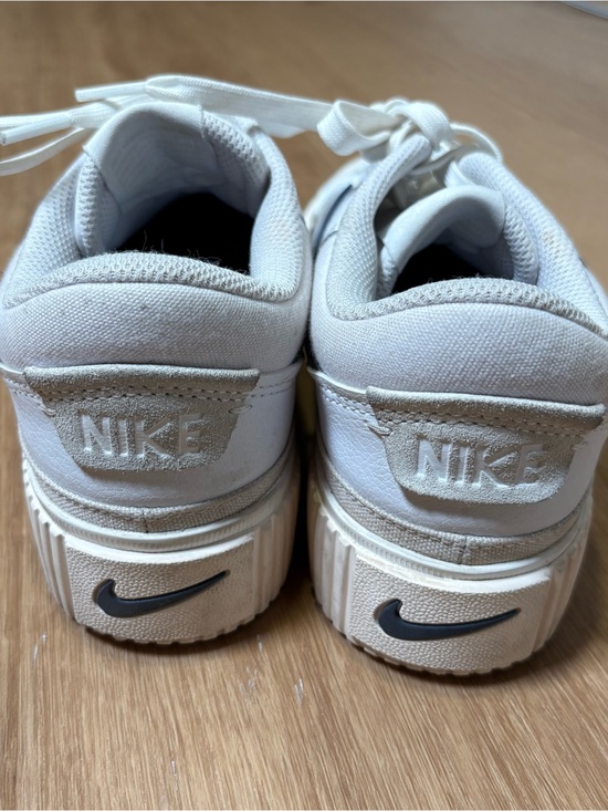 Nike White Court Vision Sneakers with Navy Swoosh Accent